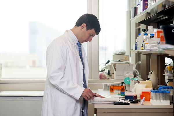 David Fajgenbaum in his lab.